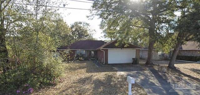 single story home with a garage