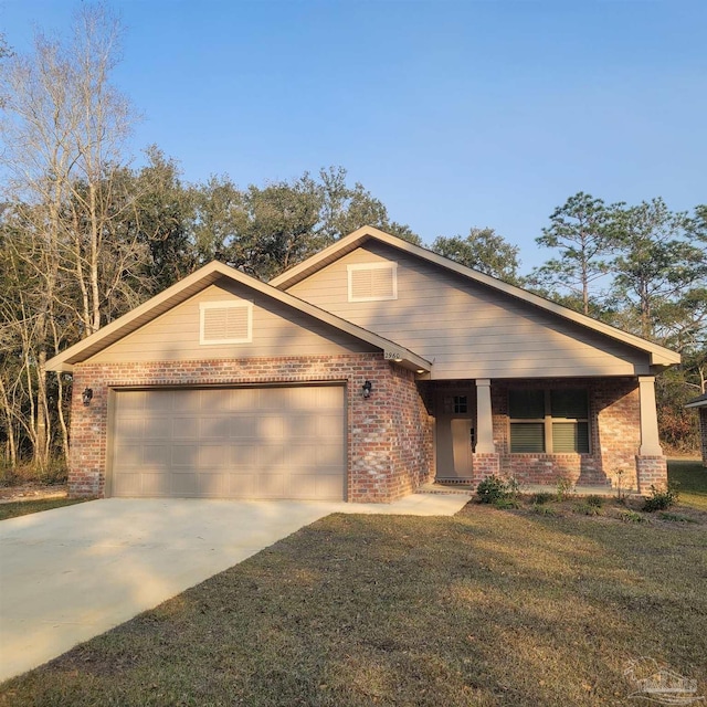 view of front facade featuring covered porch, a garage, and a front yard