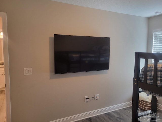 interior details featuring hardwood / wood-style flooring