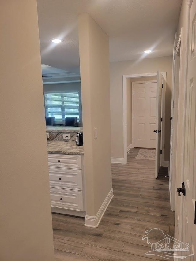 hall with dark wood-type flooring