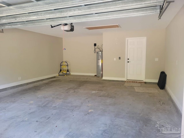 garage with electric water heater and a garage door opener