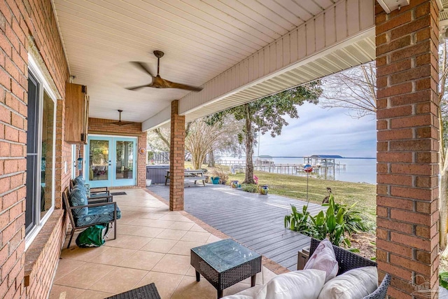 view of patio with ceiling fan and french doors