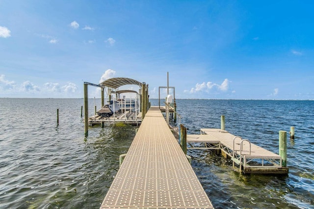 2961 Bay St, Gulf Breeze, FL 32563 - dock area featuring a water view and boat lift