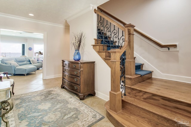 2961 Bay St, Gulf Breeze, FL 32563 - stairway with ornamental molding, tile patterned floors, baseboards, and recessed lighting
