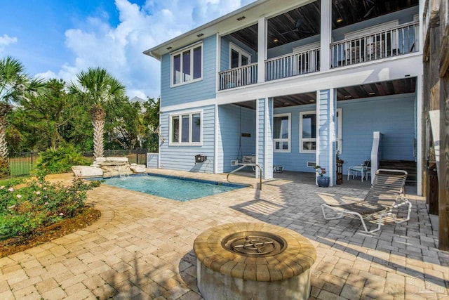 2961 Bay St, Gulf Breeze, FL 32563 - swimming pool featuring a patio and an outdoor fire pit
