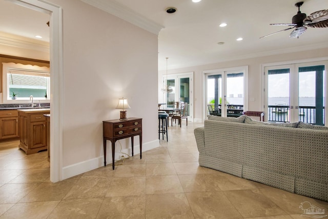2961 Bay St, Gulf Breeze, FL 32563 - living room featuring french doors, ornamental molding, a ceiling fan, baseboards, and recessed lighting