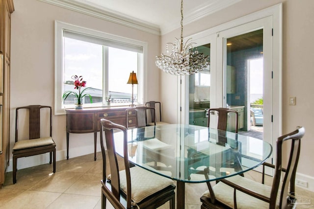 2961 Bay St, Gulf Breeze, FL 32563 - dining space featuring ornamental molding, a chandelier, light tile patterned floors, french doors, and baseboards