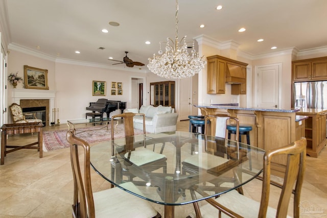2961 Bay St, Gulf Breeze, FL 32563 - dining space featuring recessed lighting, a glass covered fireplace, a ceiling fan, a chandelier, and ornamental molding
