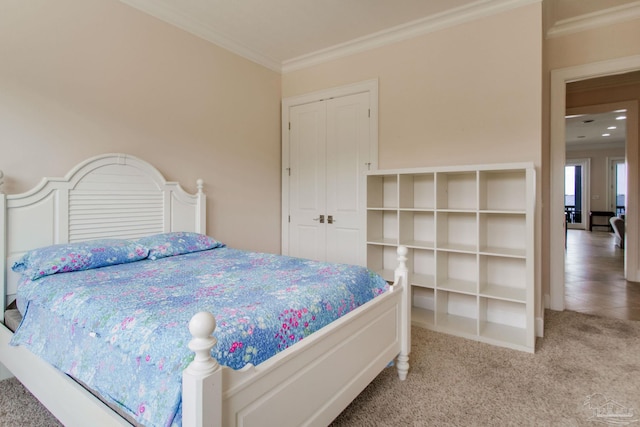 2961 Bay St, Gulf Breeze, FL 32563 - carpeted bedroom featuring ornamental molding and a closet