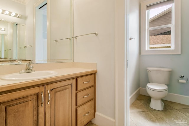 2961 Bay St, Gulf Breeze, FL 32563 - bathroom featuring vanity, toilet, baseboards, and tile patterned flooring