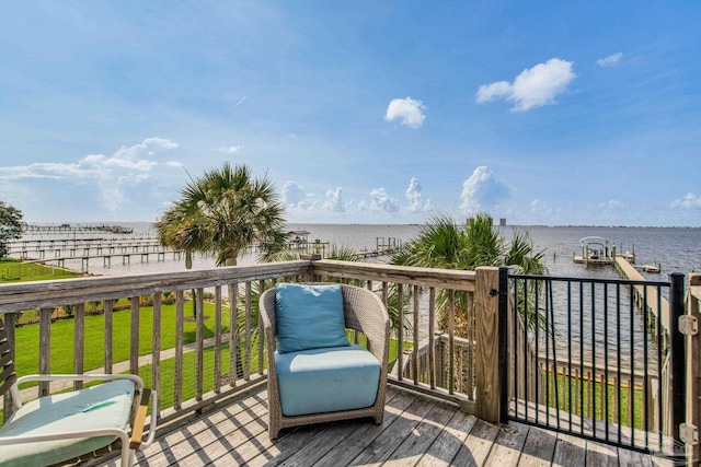 2961 Bay St, Gulf Breeze, FL 32563 - deck featuring a water view, a yard, and a dock