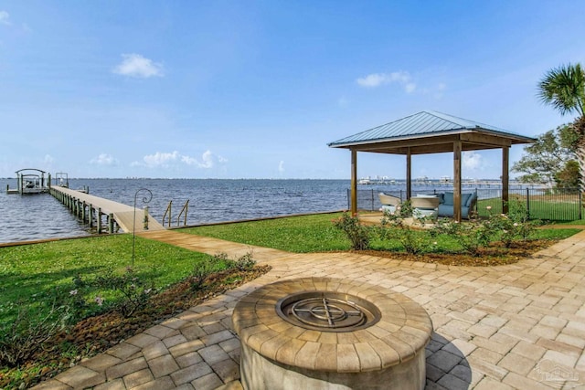 2961 Bay St, Gulf Breeze, FL 32563 - dock featuring a gazebo, a water view, an outdoor fire pit, and a patio