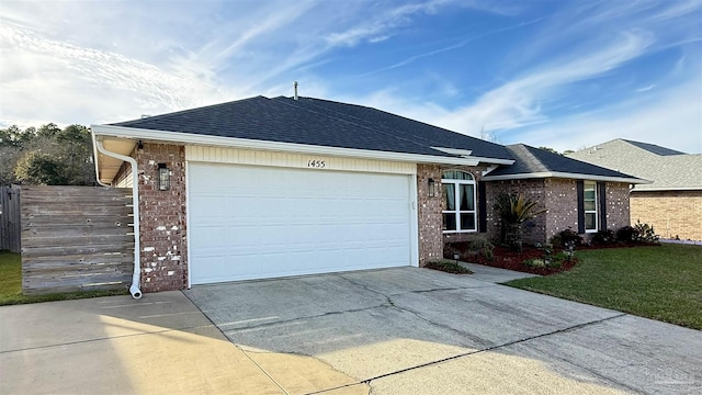 ranch-style home featuring brick siding, roof with shingles, an attached garage, driveway, and a front lawn