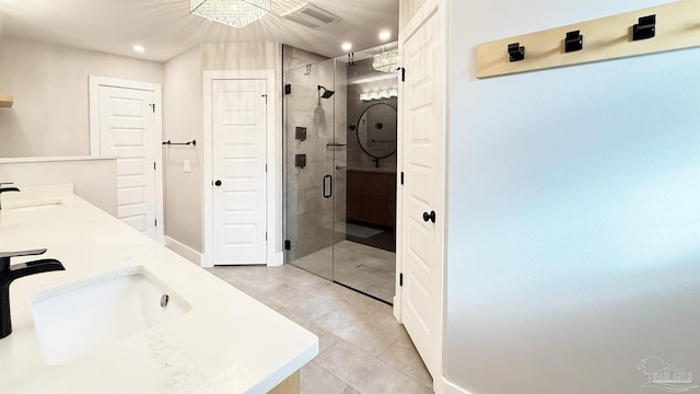 bathroom featuring recessed lighting, a sink, visible vents, double vanity, and a stall shower