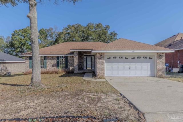 single story home featuring a garage, brick siding, driveway, and roof with shingles