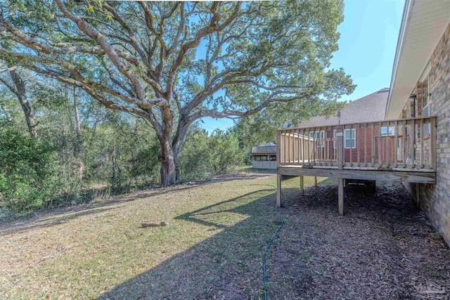 view of yard with a deck