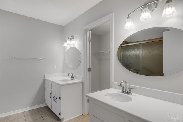 bathroom featuring tile patterned floors and vanity