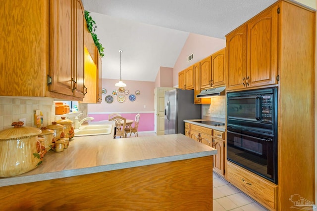 kitchen featuring tasteful backsplash, vaulted ceiling, black appliances, kitchen peninsula, and sink