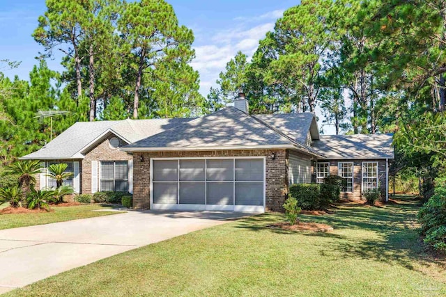 ranch-style house with a garage and a front yard