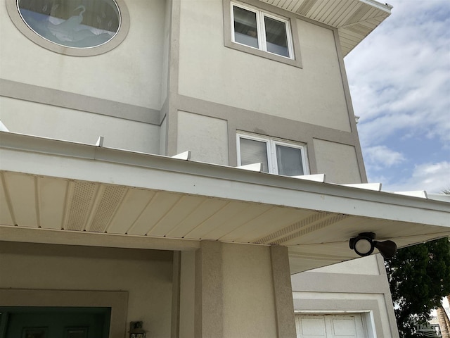 exterior details featuring stucco siding