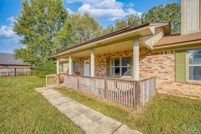 exterior space with a lawn and covered porch