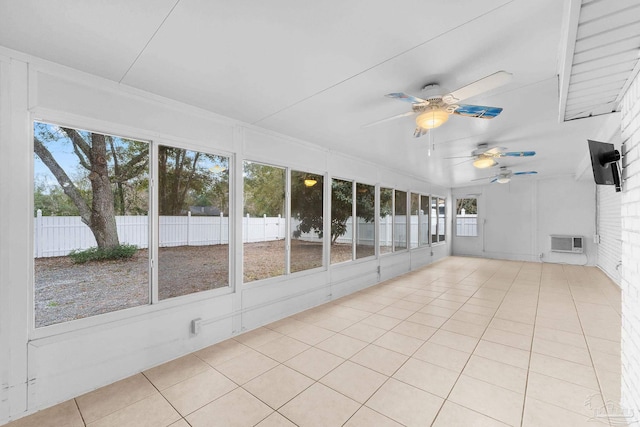 unfurnished sunroom with a wall unit AC