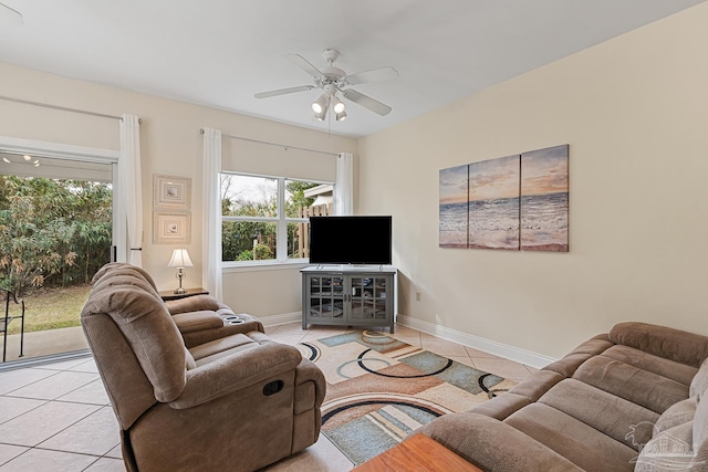 living room featuring ceiling fan and light tile patterned flooring