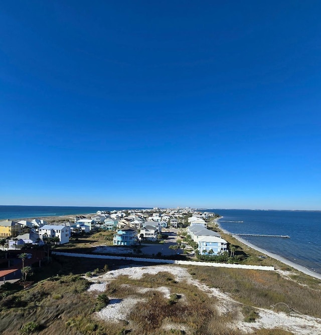 bird's eye view with a view of the beach and a water view