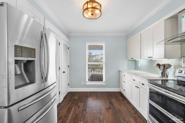 kitchen with stainless steel appliances, ornamental molding, dark hardwood / wood-style flooring, and white cabinetry