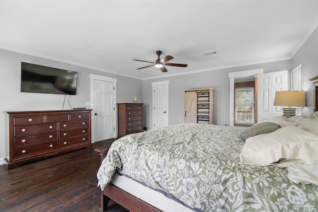 bedroom featuring ornamental molding, ceiling fan, and dark hardwood / wood-style floors