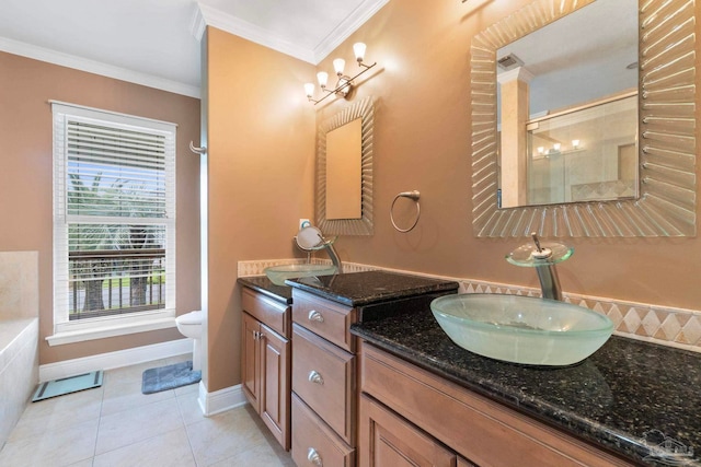 bathroom featuring crown molding, toilet, tile patterned flooring, and vanity