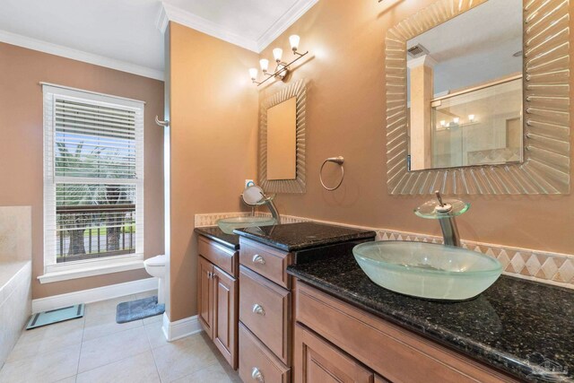 412 Deer Point Dr, Gulf Breeze, FL 32561 - bathroom with vanity, tile patterned floors, crown molding, toilet, and a shower with shower door