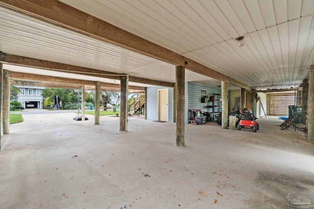 garage with a carport