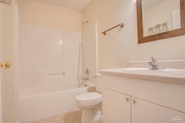 bathroom featuring toilet, tile patterned flooring, vanity, and shower / bathtub combination