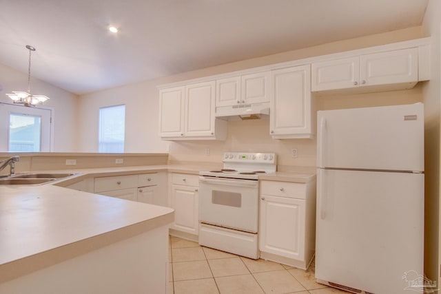 kitchen featuring white appliances, decorative light fixtures, under cabinet range hood, and white cabinetry