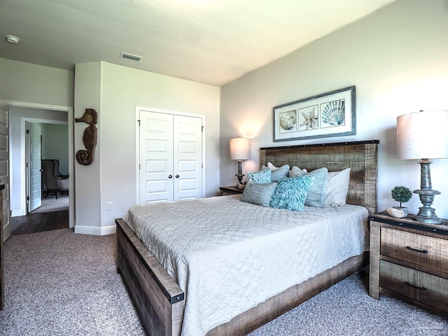 carpeted bedroom featuring a closet