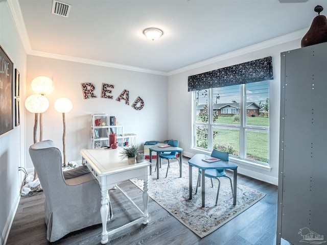 office space with dark hardwood / wood-style floors and ornamental molding