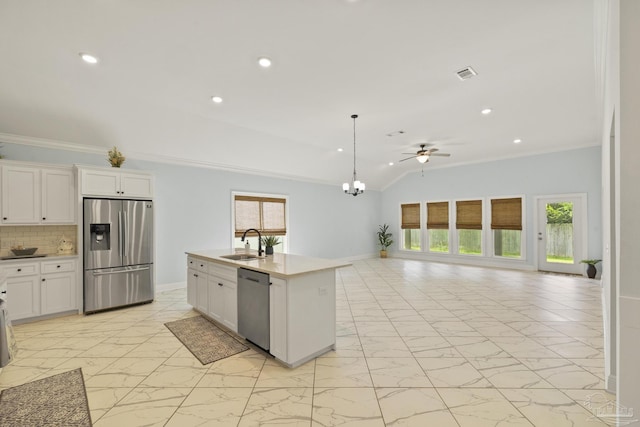 kitchen with visible vents, a sink, ceiling fan, appliances with stainless steel finishes, and marble finish floor