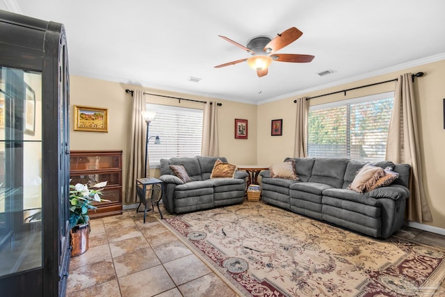 living room with crown molding, ceiling fan, and light tile patterned flooring