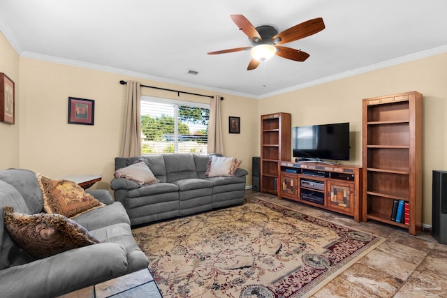 living room with ornamental molding and ceiling fan