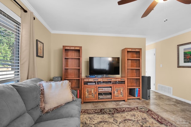 living room featuring ceiling fan and ornamental molding