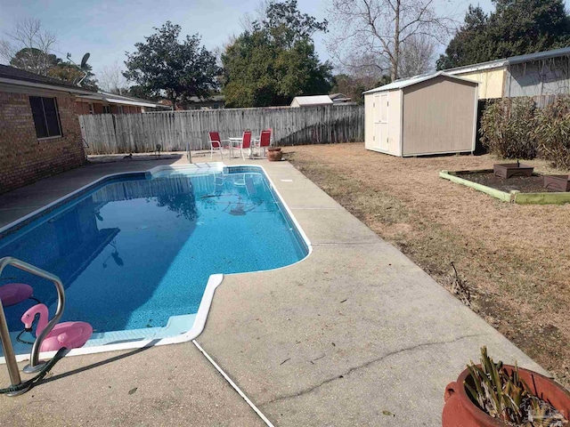 view of swimming pool featuring a patio area and a storage unit