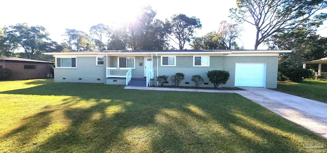 ranch-style home with a front yard, a porch, and a garage