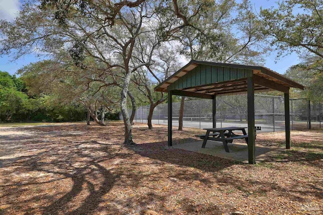 view of property's community featuring a gazebo and fence
