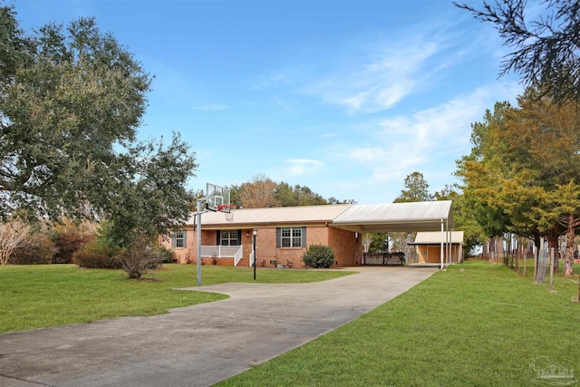 single story home with a front yard and a carport