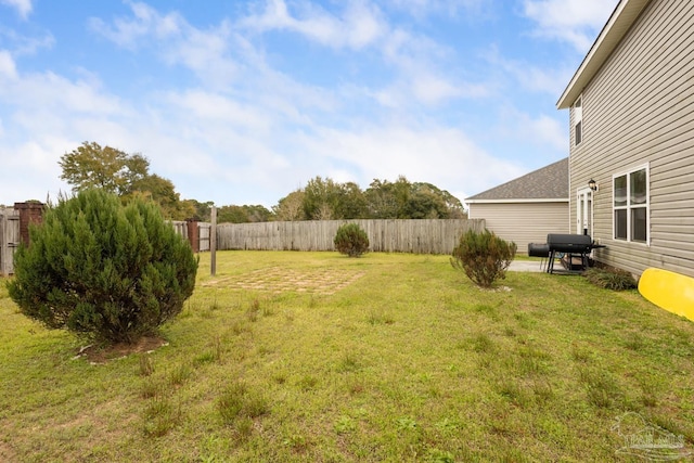 view of yard featuring fence