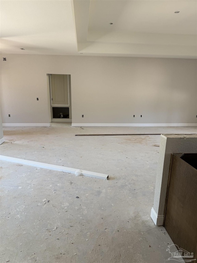 interior space featuring baseboards