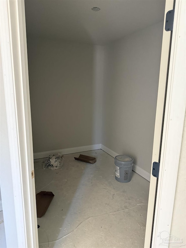 interior space with baseboards