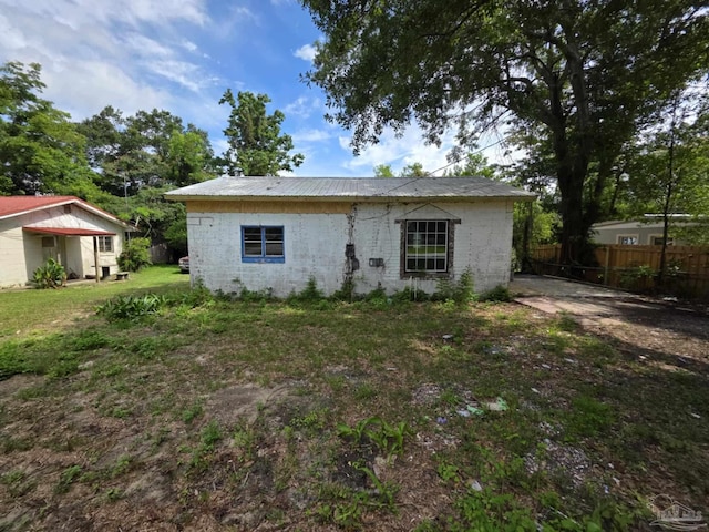 420 Forrest St, Cantonment, FL 32533 - view of front of property with a metal roof and concrete block siding