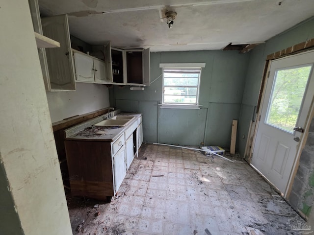 420 Forrest St, Cantonment, FL 32533 - kitchen with open shelves and white cabinets